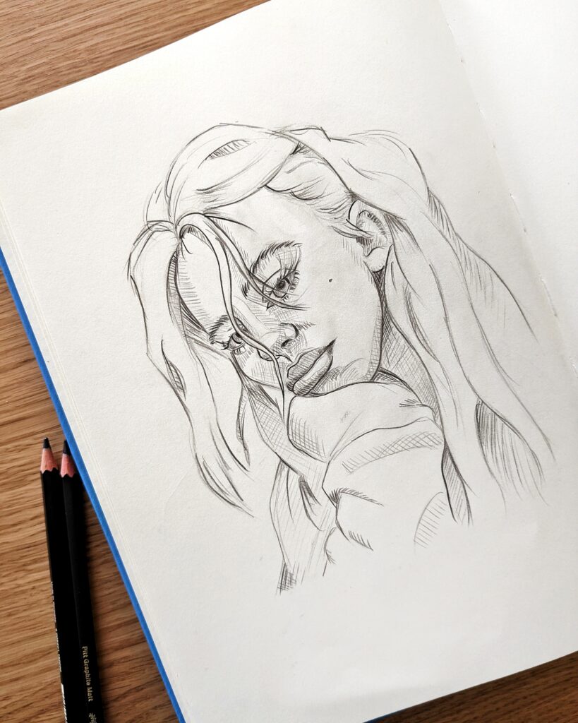 Graphite pencil portrait of Billie Eilish in black and white.