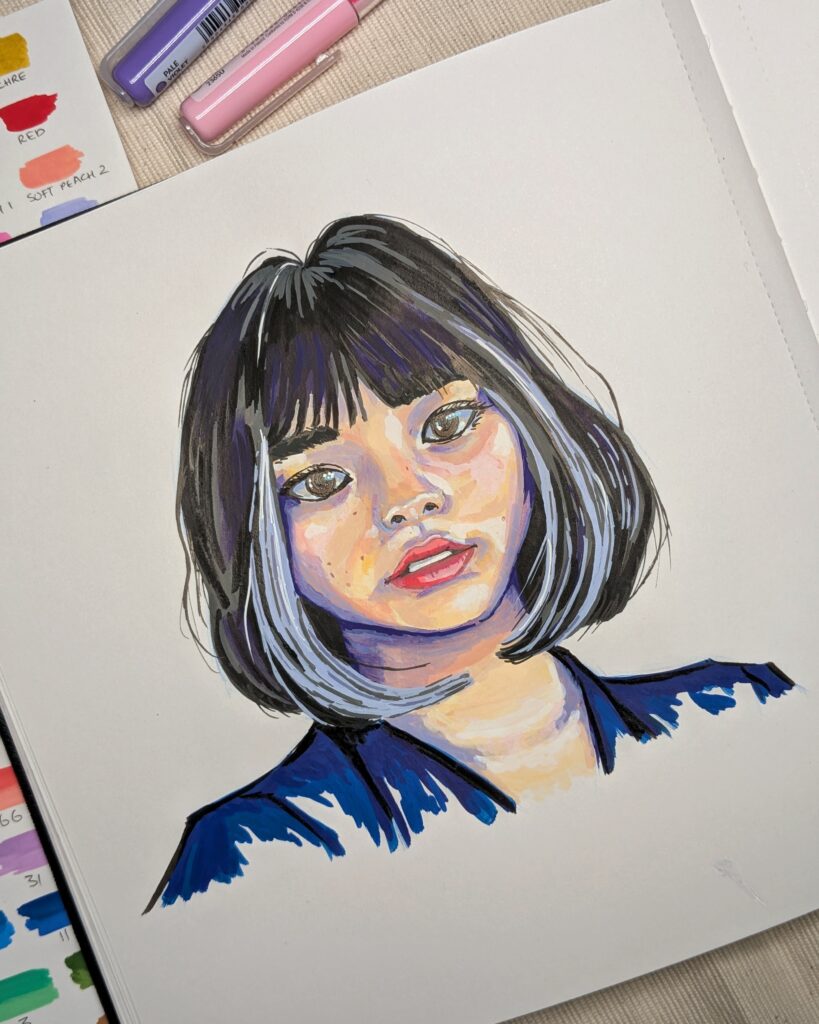 Colorful portrait drawing of a woman done with acrylic brush markers.